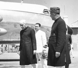 Bakshi Gulam Mohd, Prime Minister of J_K, receving Mr Nehru, Prime Minister of India