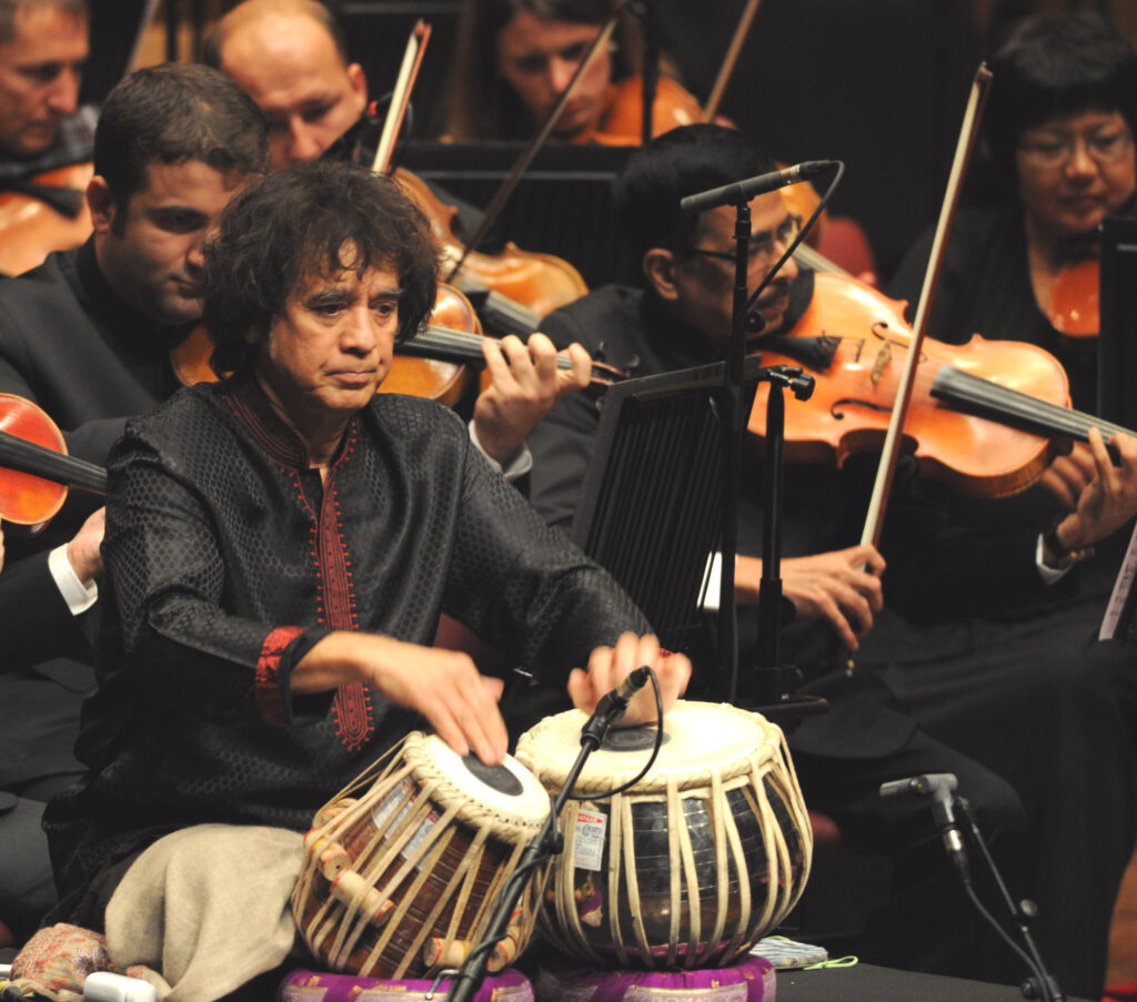 Ustad Zakir Hussain performing his composition Peshkar with the Symphony Orchestra of India at the NCPA in Mumbai, in 2015