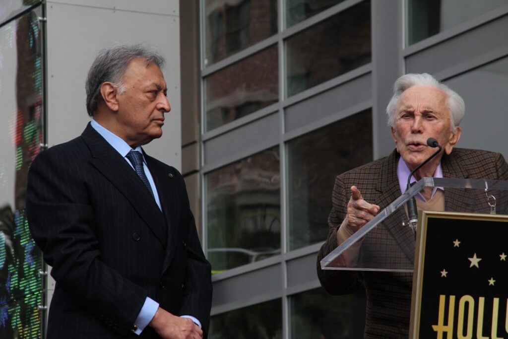 Zubin Mehta and actor Kirk Douglas (speaking) at the unveiling of the Zubin Mehta Star on the Hollywood Walk of Fame, in 2011
