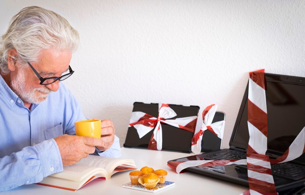 7 tips for a healthier relationship with your phone Senior reading book