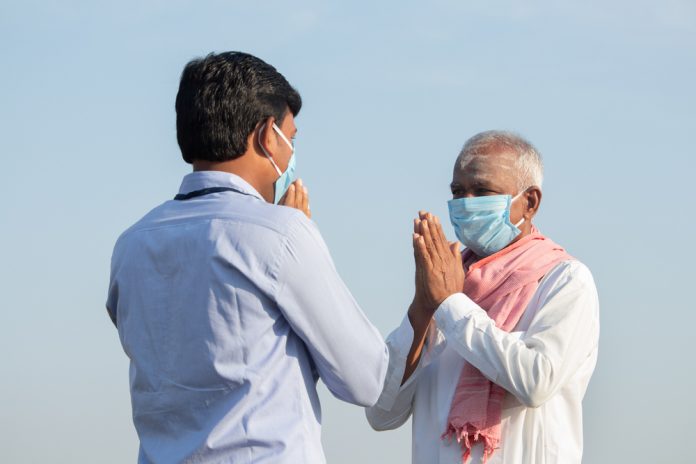 Low,Angle,View,,Farmer,Greeting,To,Banker,Or,Corporate,Government