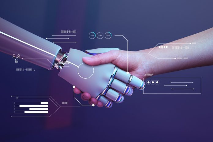 A,Human,Hand,Shakes,A,Robotic,Hand,,Symbolizing,Human-robot,Collaboration. Human hand shaking a robotic hand, symbolizing human-robot collaboration with futuristic HUD graphics surrounding the grip.